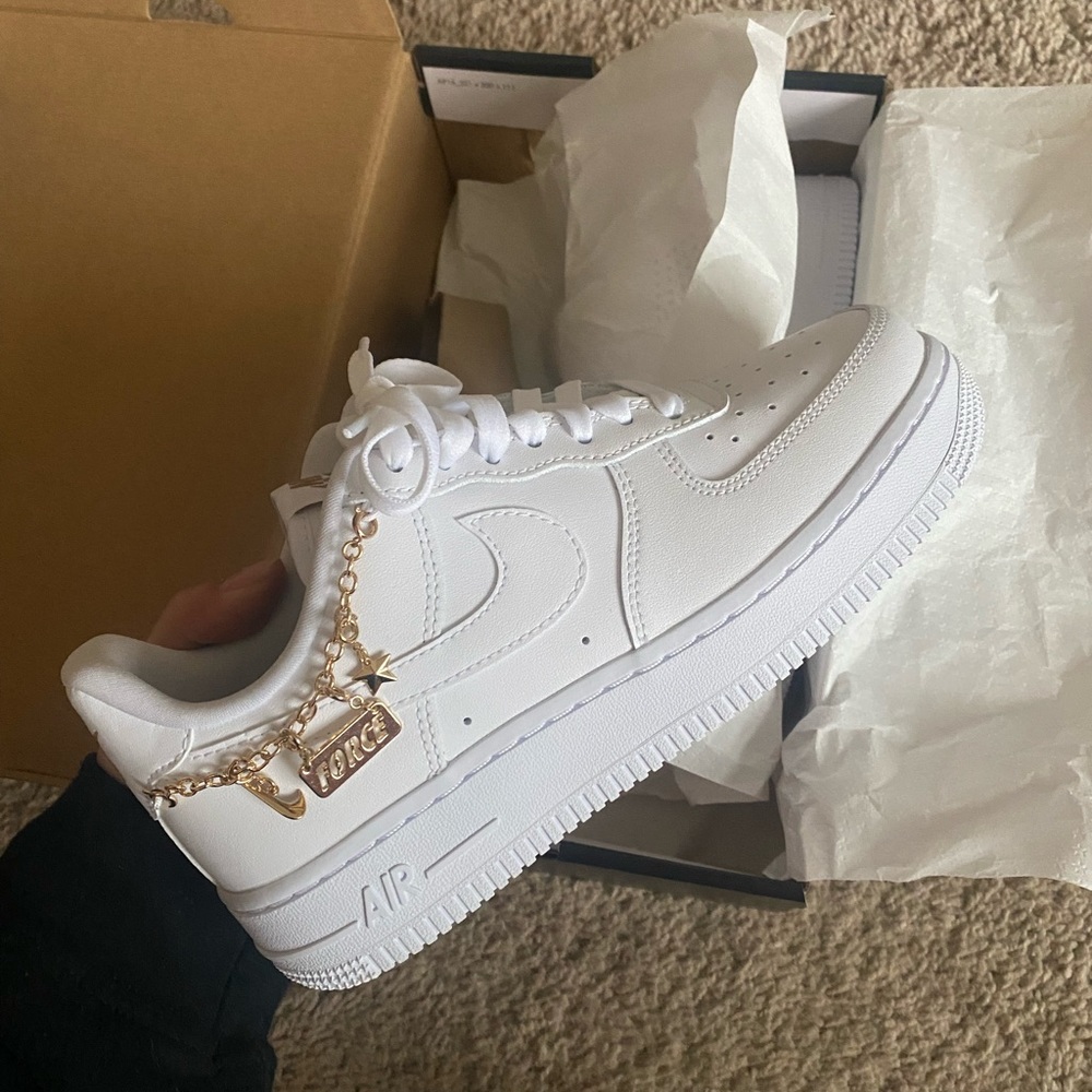 Air force one, with gold ankle chain.